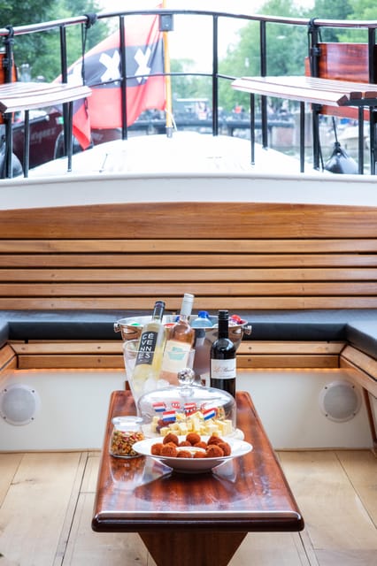 Amsterdam: Small-Group Canal Cruise incl. Drinks and Snacks - Comfortable and Well-Equipped Electric Boat Giuliana