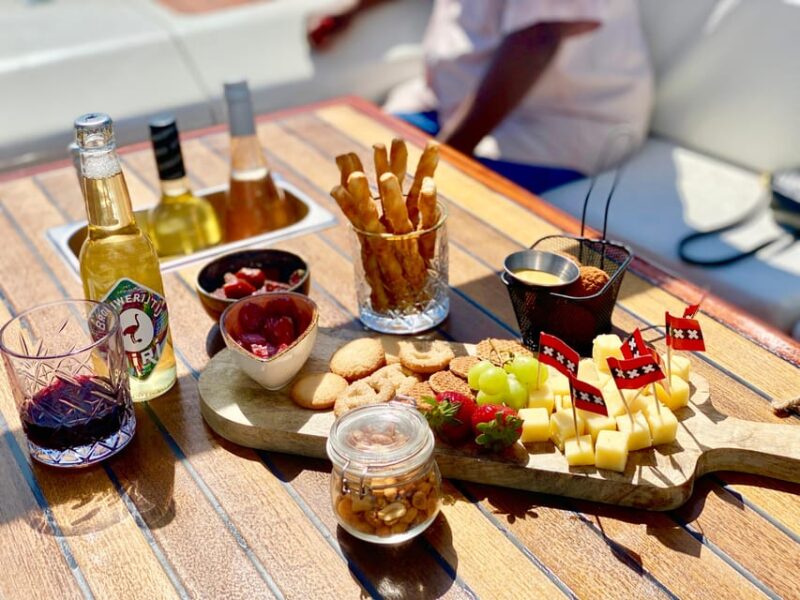 Amsterdam Small-Group Canal Cruise Including Snacks/Drinks - Discover Amsterdam from Its Charming Canals for $66