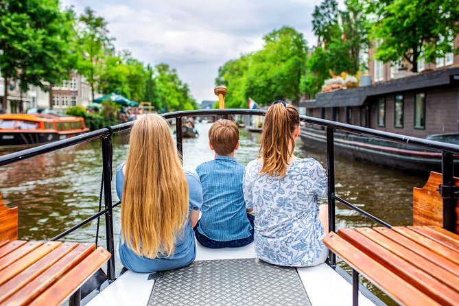 Amsterdam Small-Group Canal Cruise With Dutch Snacks and Drink - Exploring Iconic Bridges and Cultural Spots