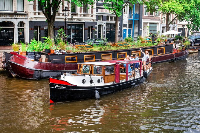 Amsterdam Small-Group Canal Cruise With Dutch Snacks and Drink - Snacks, Drinks, and the Local Touch
