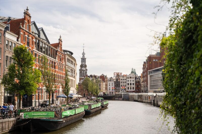 Amsterdam Small-Group Walking Tour with Canal Cruise - Discovering the Hidden Corners: Begijnhof and Flower Market