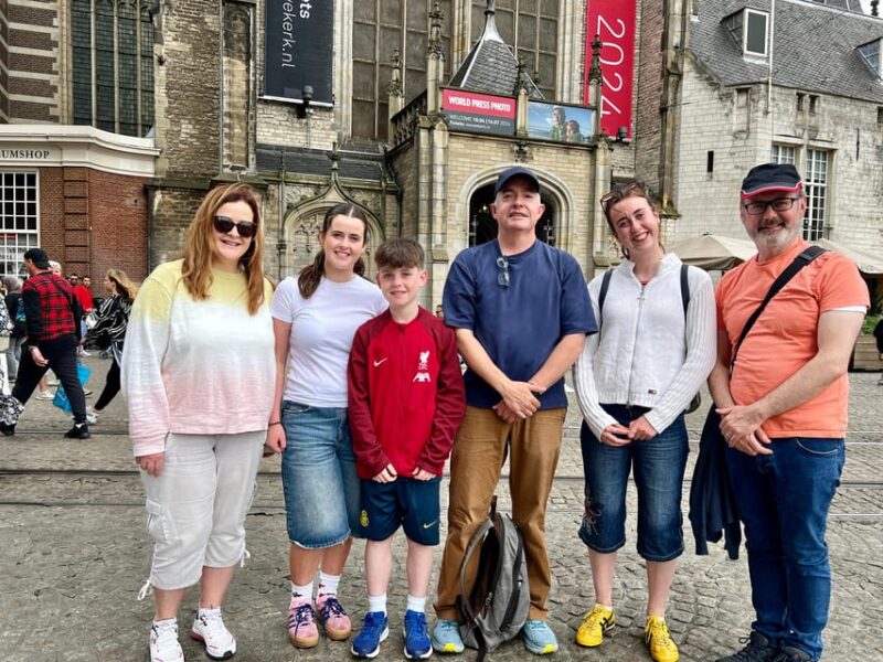 Amsterdam: Small Group Walking Tour with Fun Guide - Visiting Key Highlights: From Dam Square to Canals and Hidden Gardens