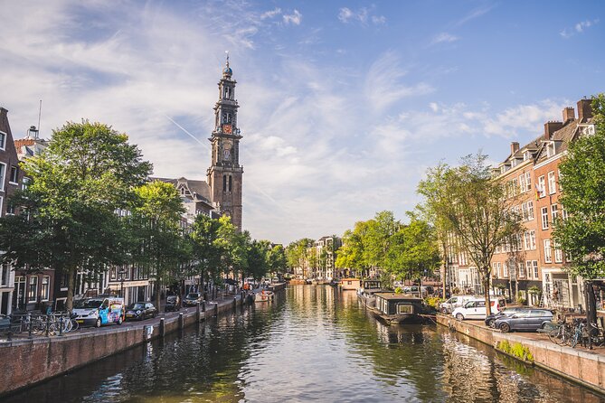 Amsterdam Small-Group Walking Tour with Typical Dutch Pancake - Discovering the Nieuwmarkt and San Antón Gate