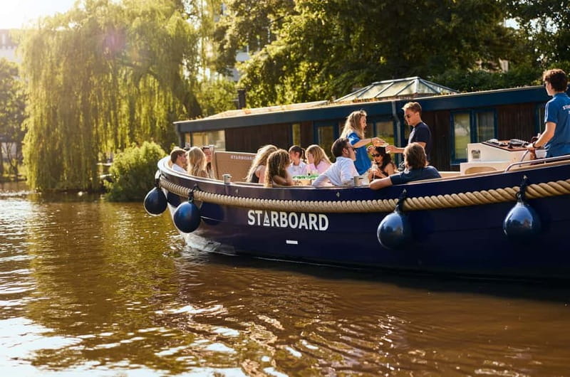 Amsterdam: Spanish Guided Open Boat Cruise with Bar Onboard - The Scenic Route Through Amsterdam’s Historic Canals