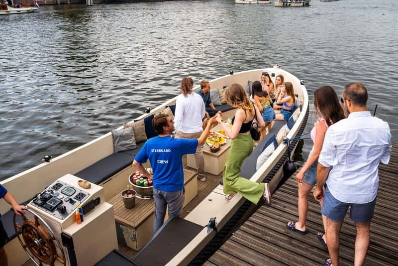 Amsterdam: Spanish Guided Open Boat Cruise with Bar Onboard - What You Will See: Landmarks and Local Scenery