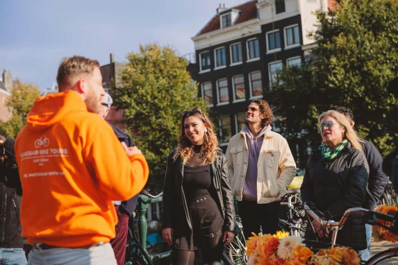 Amsterdam: Top Highlights Guided Bike Tour in EN/DE/ES/FR/IT - The Stops That Make the Tour Special