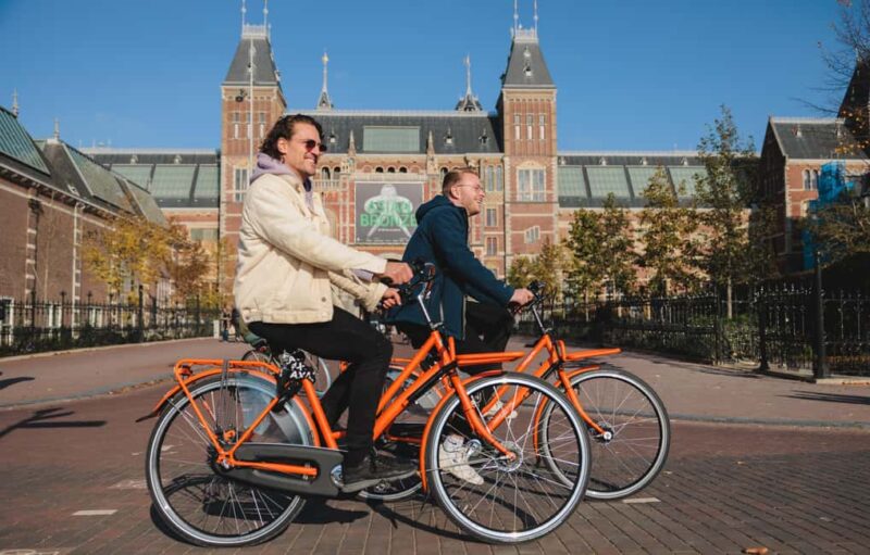 Amsterdam: Top Highlights Guided Bike Tour in EN/DE/ES/FR/IT - Practical Tips and Considerations
