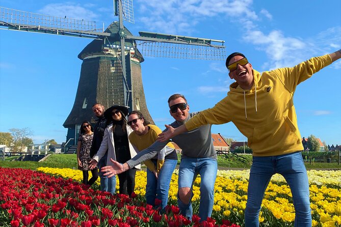 Amsterdam: Tulip Fields Day Tour with Lunch and a Windmill Visit - Authentic Dutch Lunch in Onderdijk with Historic Church Views