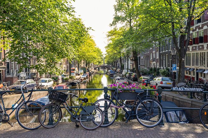 Amsterdam Walking Tour and Cruise with Drinks and Cheese Tasting - Visiting Nieuwmarkt and San Anton Gate