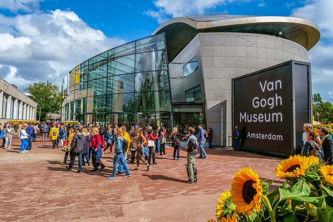 Amsterdam Walking Tour with Audioguide on Your Smartphone - Visiting the Oldest Wooden House and Its Medieval Roots
