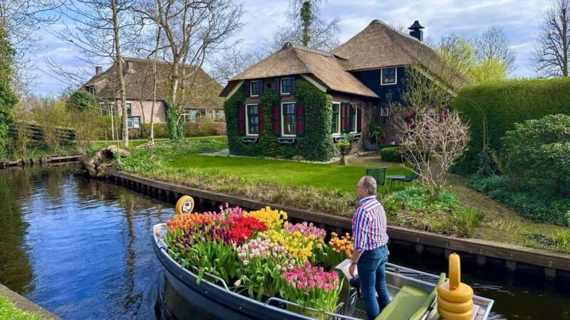 Amsterdam: Windmill, Logo and Zaandam Chinese Day Tour - Scenic Transit to Giethoorn for a Relaxing Break
