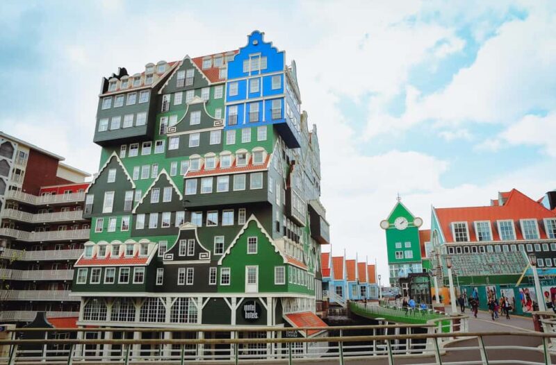 Amsterdam: Windmill, Logo and Zaandam Chinese Day Tour - The Boat Tour Along Narrow Rivers in Giethoorn