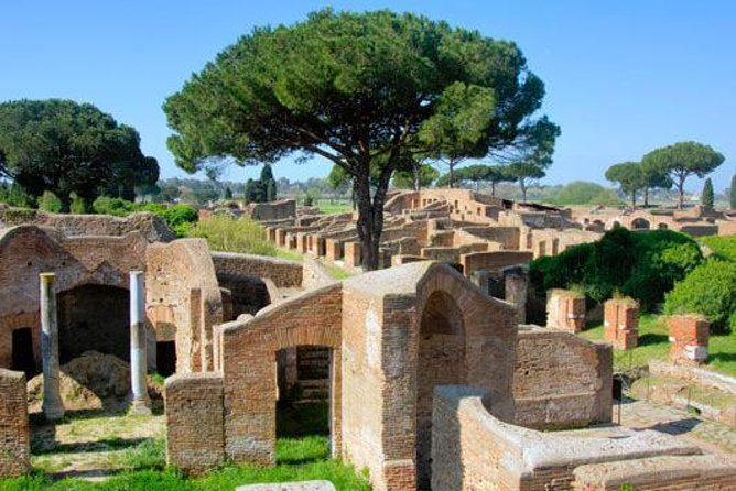 Ancient Ostia Antica Semi-Private Day Trip from Rome by Train with Guide - Walking through the well-preserved ruins of Ostia Antica