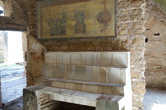 Ancient Ostia Antica Semi-Private Day Trip from Rome by Train with Guide - The Unique Charm of the Site’s Preservation