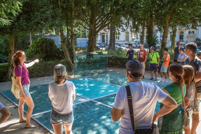 Anne Frank Guided Walking Tour through Amsterdam's Jewish Quarter - Logistics, Group Size, and Practical Tips