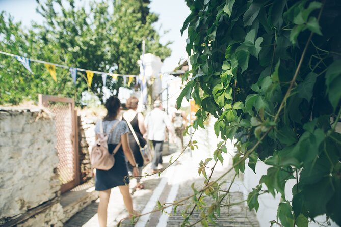 Ano Poli: A walking tour in Thessaloniki's colorful Old Town - Strolling Down Narrow Streets and Architectural Highlights