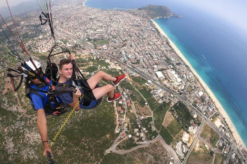 Antalya: Tandem Paragliding Experience with Transfer - Logistics: Transportation and Availability