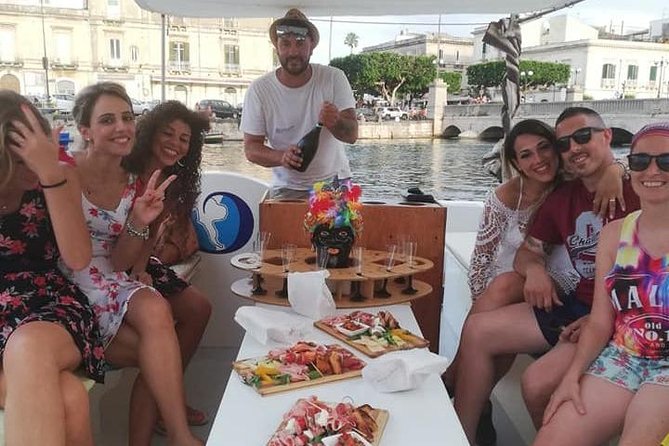 Aperitif on the boat at Sunset island and sea caves - The Captain and Crew: Knowledgeable and Friendly