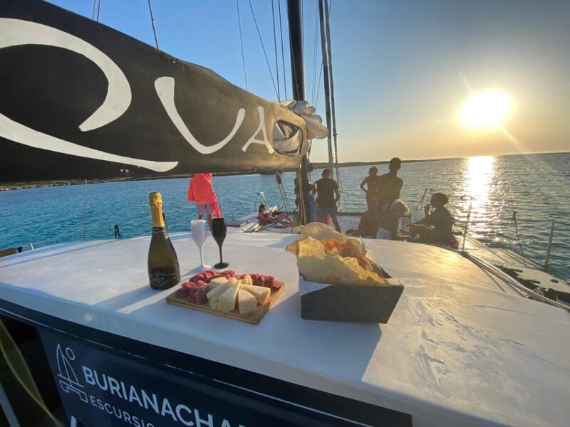aperitifs at sunset on the Stintino catamaran burianaCharter - Key Points