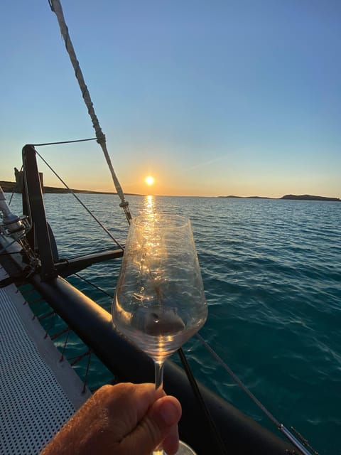 aperitifs at sunset on the Stintino catamaran burianaCharter - Enjoying Sardinian Wines and Cheeses Aboard the Catamaran