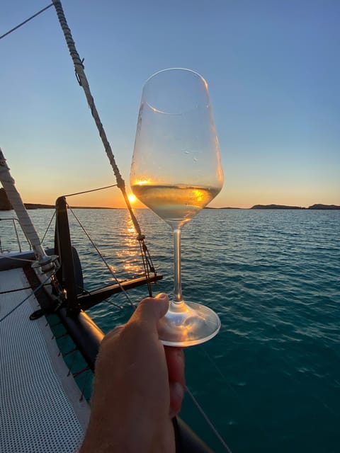 aperitifs at sunset on the Stintino catamaran burianaCharter - Swimming Stops in the Clear Sardinian Sea