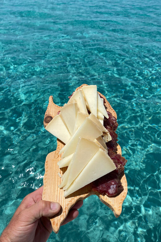 aperitifs at sunset on the Stintino catamaran burianaCharter - The Experience of Watching the Sunset from the Water