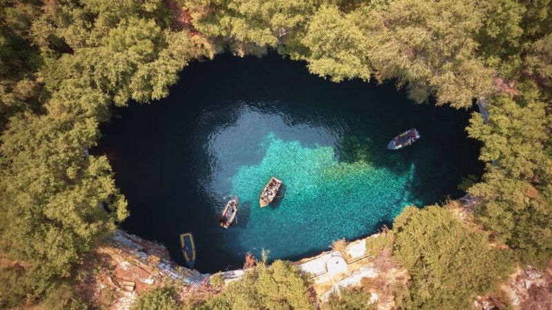 Argostoli: Melissani & Drogarati Cave Tour with Wine Tasting - Visiting the Iconic Melissani Cave with a Traditional Wooden Boat Ride