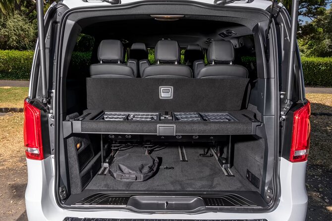 Arrival Private Transfer from Bergen Airport BGO to Bergen by luxury minivan - Meet Your Chauffeur at Bergen Airport Arrivals Lounge