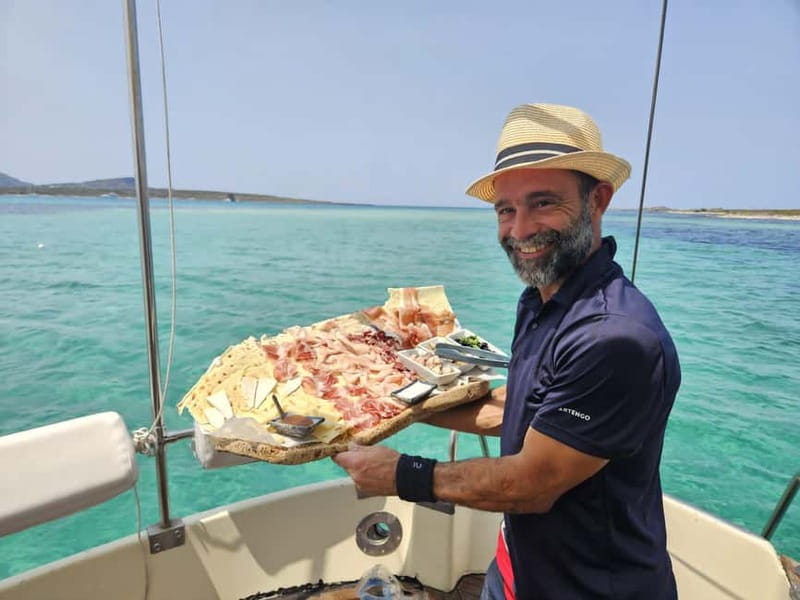 ASINARA: motorboat tour of the island park, aperitif, lunch on board. - Key Points