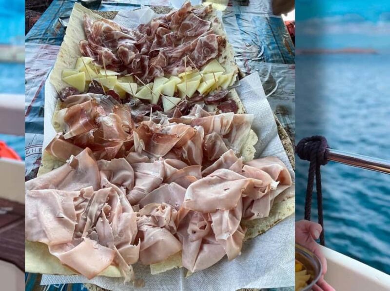 ASINARA: motorboat tour of the island park, aperitif, lunch on board. - Lunch on Board: Fresh Seafood and Local Wines