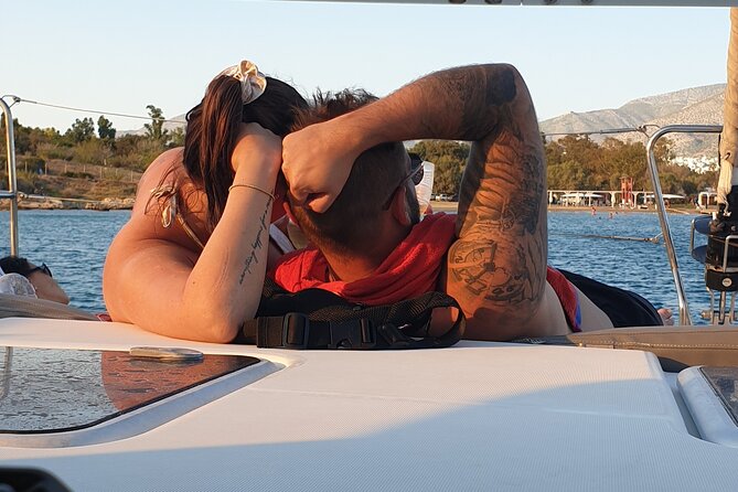 Athens Riviera Catamaran tour with fresh Meal Drinks and Swimming - Relaxing, Snorkeling, and Socialising at Sea