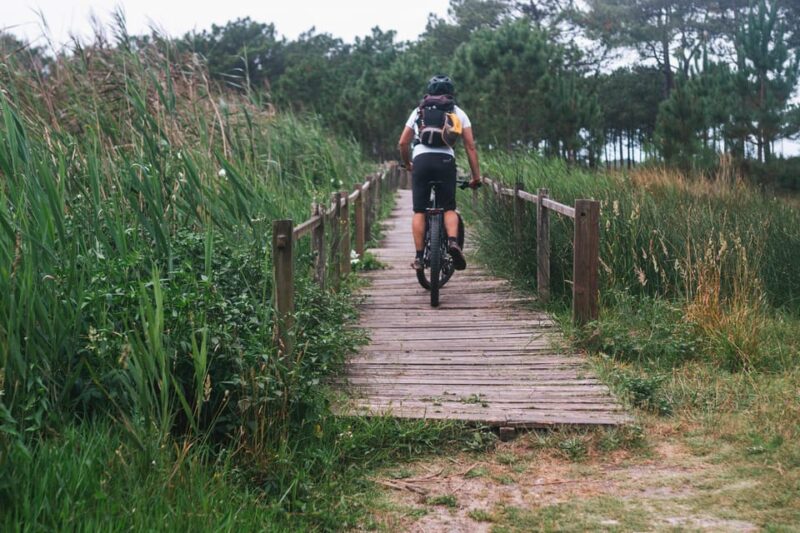 Atlantic Coast E-bike and Glass Museum tour - Practical Information: Booking, Cancellation, and Language Options