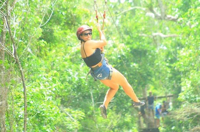 ATV Adventure, Zipline and Cenote Swim Tour from Cancun - Ziplining over Tropical Tree Canopies