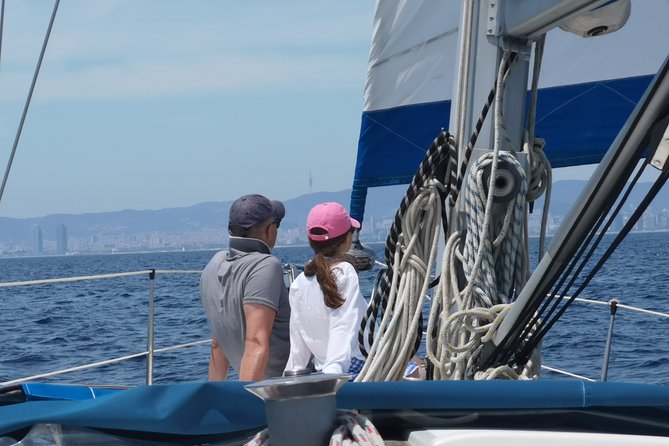 Authentic Barcelona Sailing Tour with Swim & Drinks - Key Points