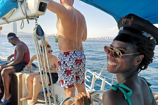Authentic Barcelona Sailing Tour with Swim & Drinks - Drinks, Snacks, and Local Flavors on Board