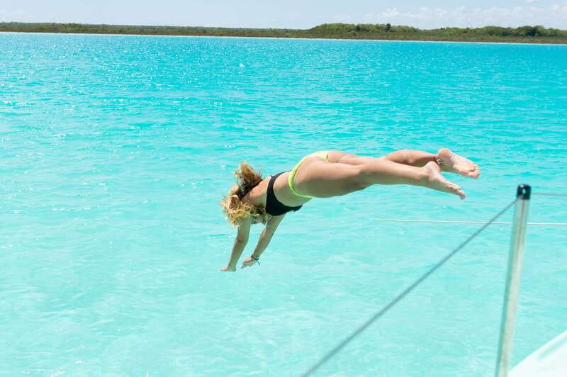 Bacalar: Group Sailing Trip with Swimming and Drinks - Exploring Cenote Esmeralda and Its Mystique