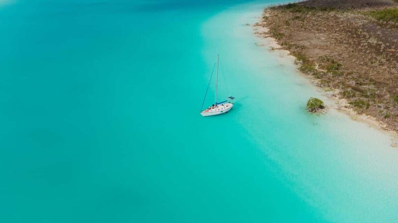 Bacalar Lagoon Sailing Tour with Open Bar and Mexican Lunch - Swimming, Relaxing, and Free Time in the Lagoon