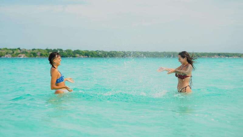 Bacalar Lagoon Sightseeing Boat Tour with Open Bar & Snack - The Secret Stop with Picnic, Sunset, and Swimming