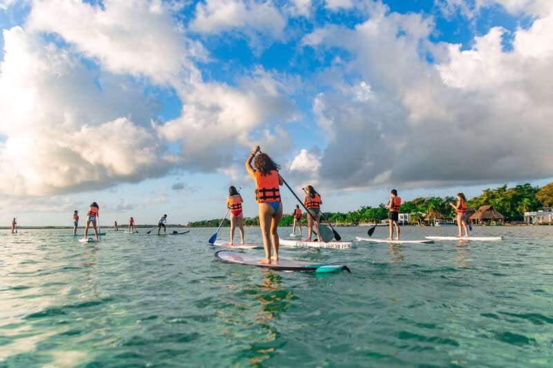 Bacalar: Sunrise Paddleboard Tour with Floating Picnic - Stops at Cenote Negro and Isla de los Pájaros