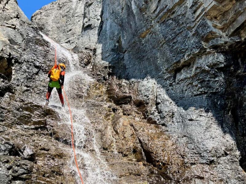 Banff: Ghost Canyon Tour with Slides, Rappels, & Jumps - Guides and Multilingual Support
