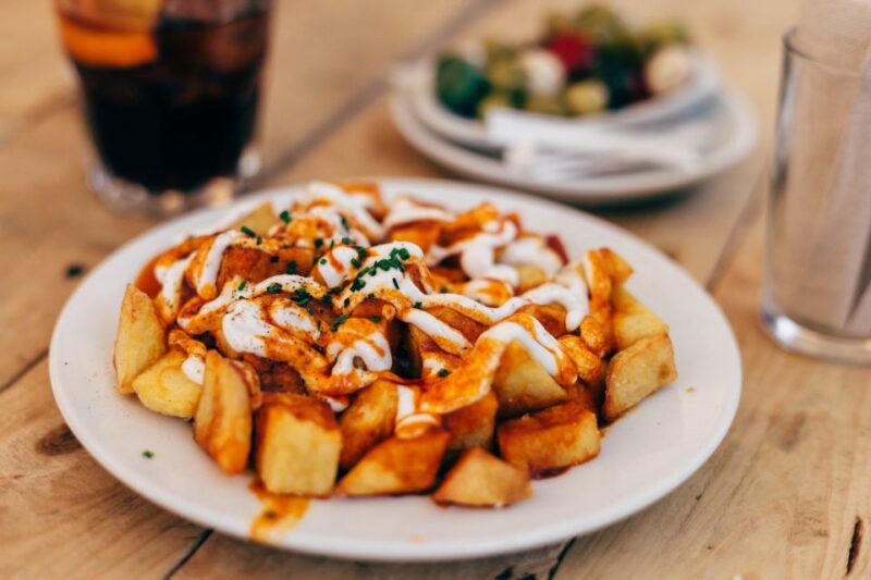 Barcelona: 2-Hour Bites & Flavors Private Food Tour - Exploring Barcelona’s Markets and Neighborhoods