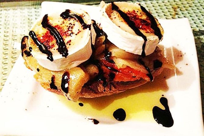 Barcelona Art and Tapas Small Group Walking Tour with Picasso Museum - Discovering the Romantic Plaça Sant Felip Neri