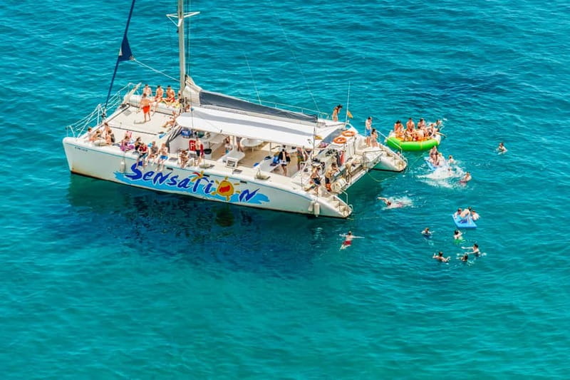 Barcelona: Catamaran Party Cruise with BBQ Meal - The Swimming Stop near Badalona