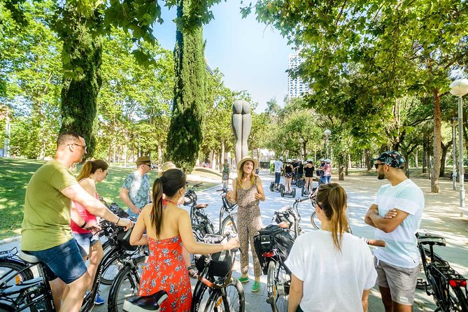 Barcelona E-Bike Small Group Tour with Tapas & Wine Tasting - Discovering Port Vell and the Waterfront Attractions