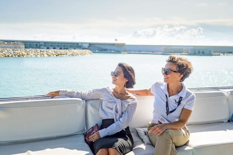 Barcelona: E-Bike Tour with Montjuic Cable Car & Boat Ride - Visiting Montjuïc Castle and Historic Sites