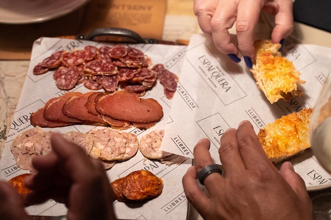 Barcelona: Evening Foodie Adventure with 8 Tapas & 4 Drinks - Discovering the Stories Behind Plaça de Sant Felip Neri