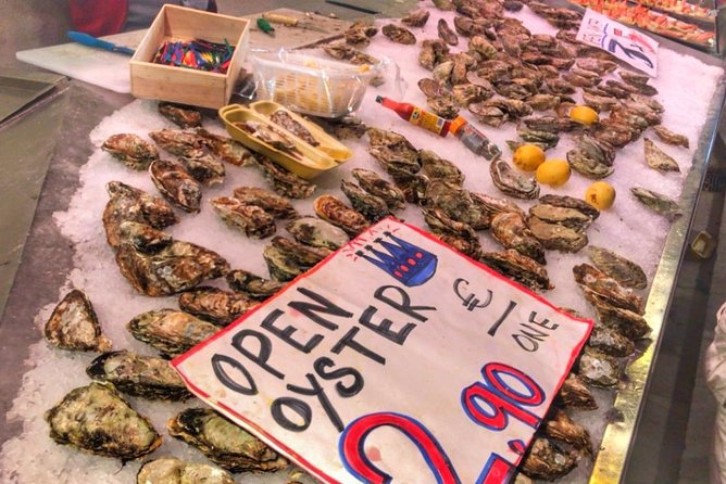 Barcelona Food Tour: Market & Gothic Quarter with Expert Guide - Tasting at a Family-Run Deli and the Sweet Tradition