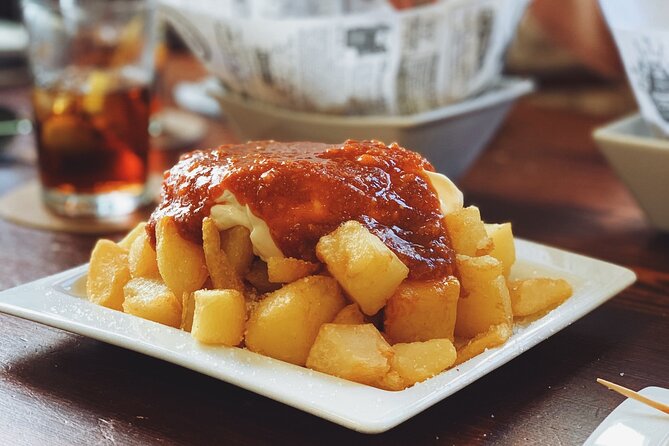 Barcelona Food Tour: Tapas, Drinks and Delights with a Local - Hidden Bars and Authentic Atmospheres