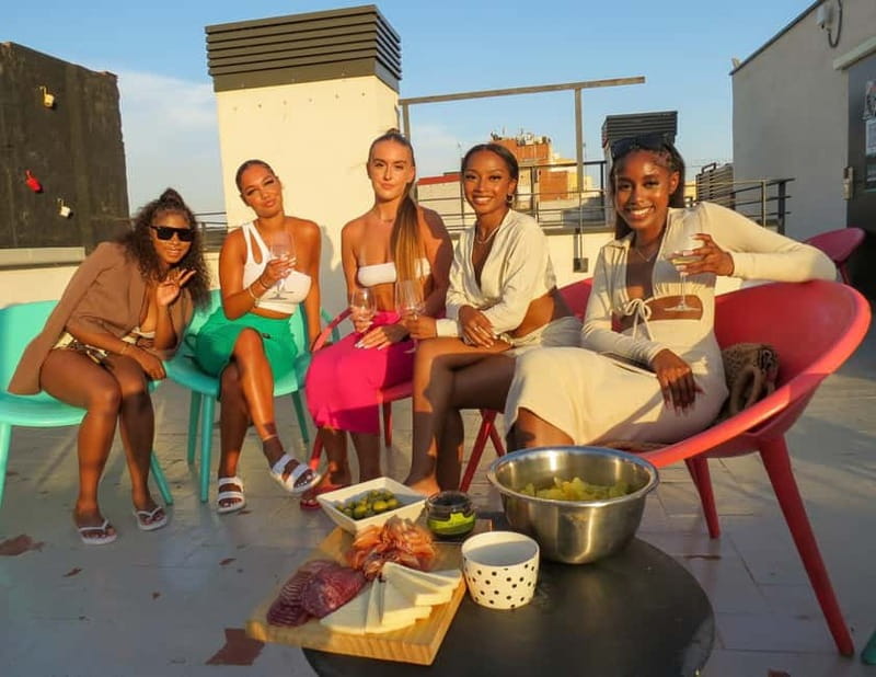 Barcelona: Fun & Unpretentious Rooftop Wine Tasting - Snacks and Music to Enhance the Experience