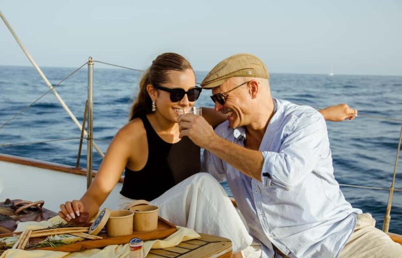 Barcelona: Gourmet Wine & Cheese and Sailing cruise - Relaxing on Deck with Scenic Views